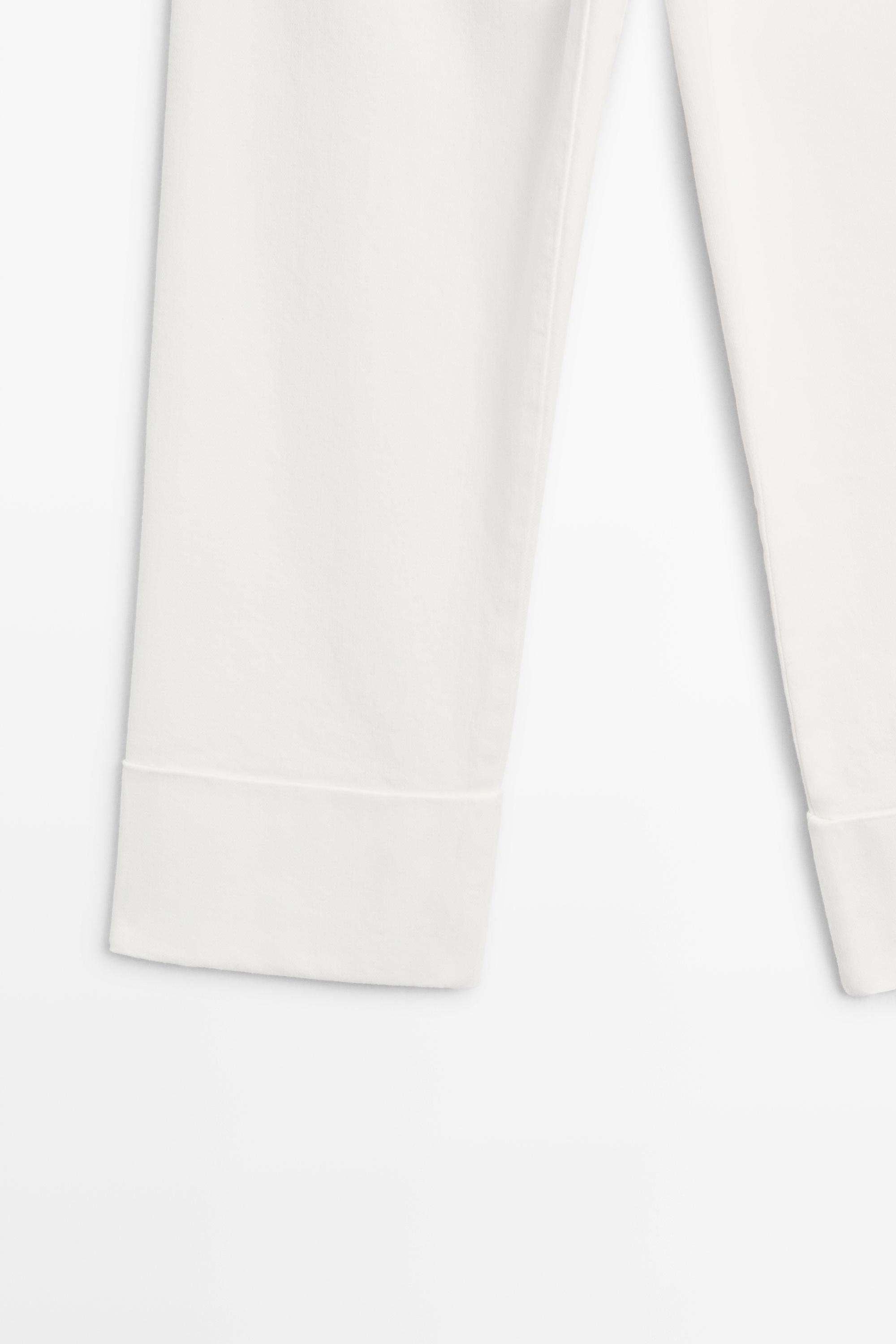 Jean capri taille moyenne retroussé
